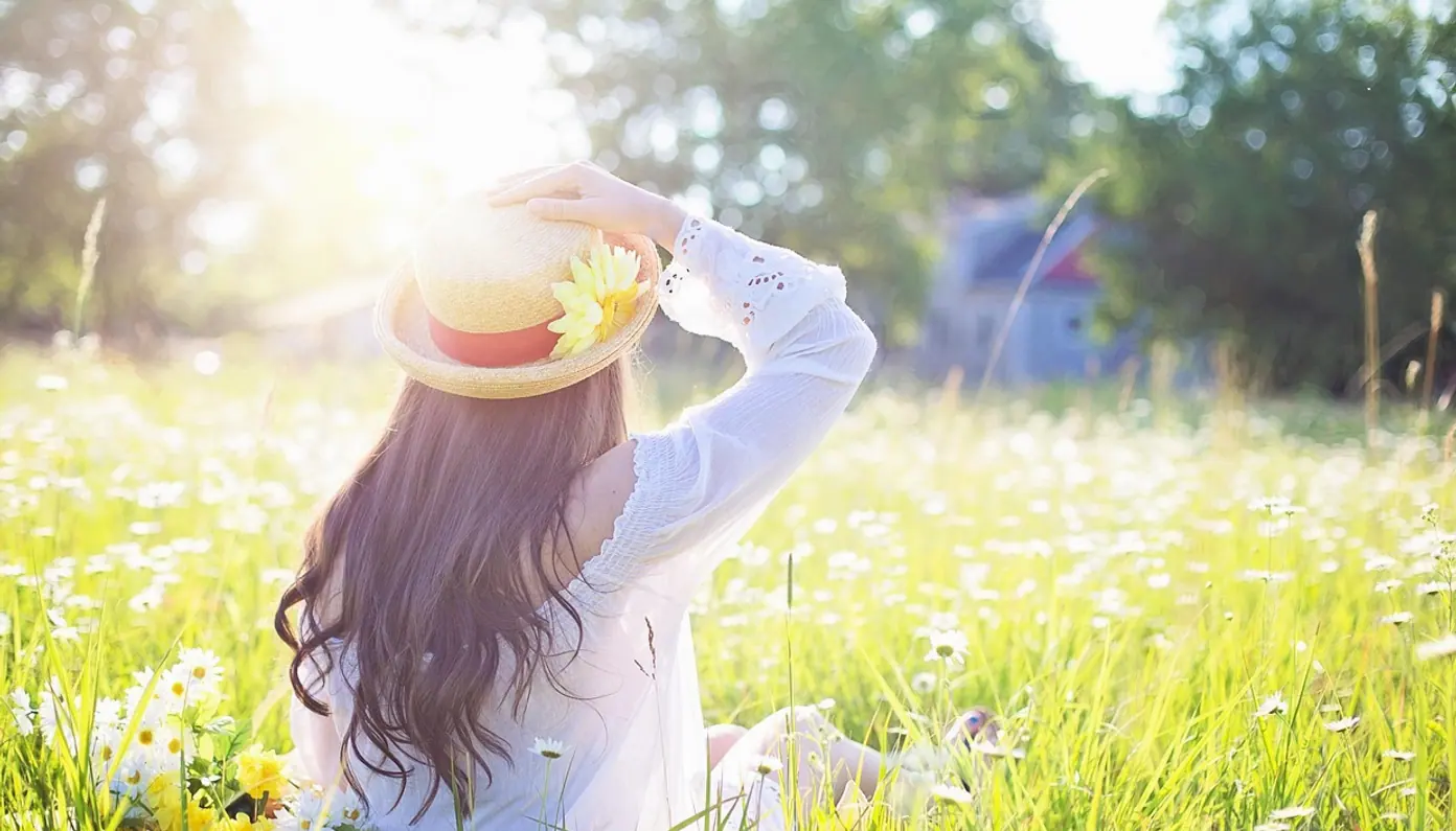 Woman, field and sunlight